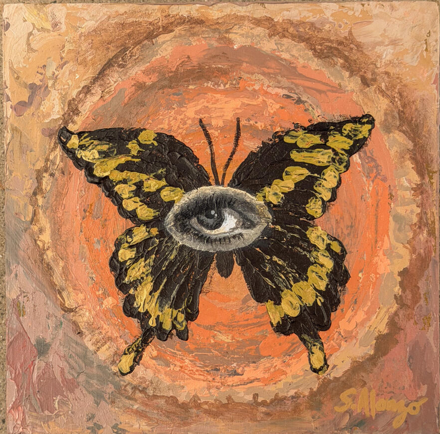 vibrant Butterfly painting with black and white eye painted in the middle